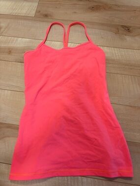 Bright orangey/pink Lululemon power y tank